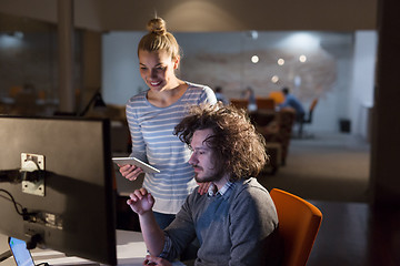 Image showing young designers in the night office