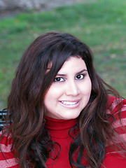 Image showing Large attractive woman portrait outdoors red top