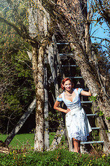 Image showing Portrait of a laughing woman in dirndl