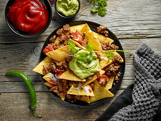 Image showing corn chips nachos with fried minced meat