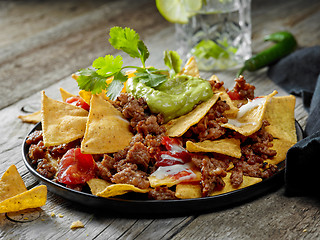 Image showing corn chips nachos with fried minced meat