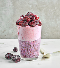 Image showing dessert of chia seeds and frozen banana and blackberries
