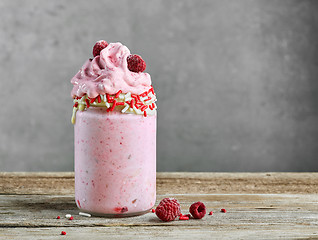 Image showing dessert of frozen banana and raspberries