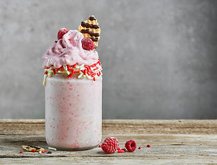 Image showing dessert of frozen banana and raspberries