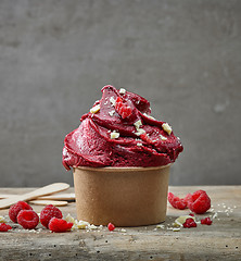 Image showing raspberry sorbet decorated with white chocolate pieces