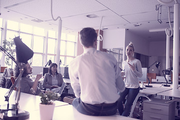 Image showing Young Business Team At A Meeting at modern office building