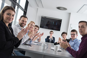 Image showing Group of young people meeting in startup office