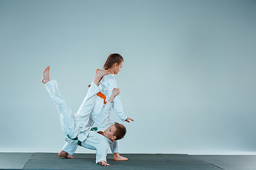 Image showing The boy fighting at Aikido training in martial arts school. Healthy lifestyle and sports concept