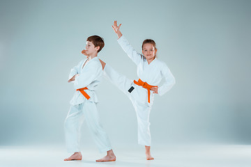 Image showing The boy fighting at Aikido training in martial arts school. Healthy lifestyle and sports concept