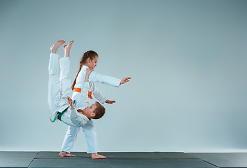 Image showing The boy fighting at Aikido training in martial arts school. Healthy lifestyle and sports concept