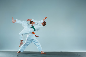 Image showing The boy fighting at Aikido training in martial arts school. Healthy lifestyle and sports concept