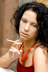 Image showing brunette with cigarette