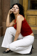 Image showing brunette with cigarette