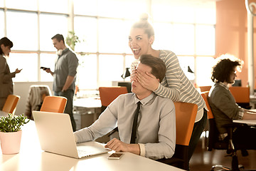 Image showing Two Business People Working With laptop in office