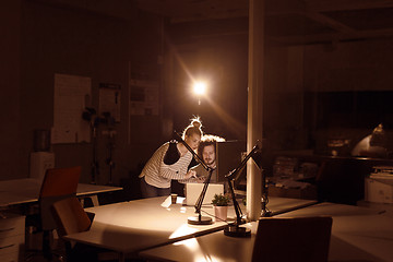 Image showing young designers in the night office