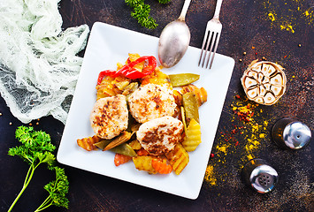 Image showing baked vegetables with cutlet