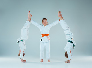 Image showing The boys fighting at Aikido training in martial arts school. Healthy lifestyle and sports concept