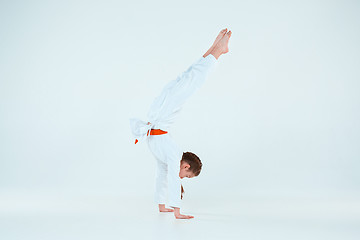 Image showing The girl posing at Aikido training in martial arts school. Healthy lifestyle and sports concept