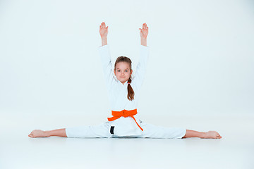 Image showing The girl posing at Aikido training in martial arts school. Healthy lifestyle and sports concept