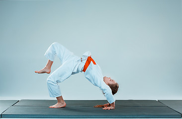 Image showing The girl posing at Aikido training in martial arts school. Healthy lifestyle and sports concept