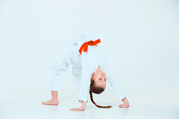 Image showing The girl posing at Aikido training in martial arts school. Healthy lifestyle and sports concept