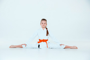 Image showing The girl posing at Aikido training in martial arts school. Healthy lifestyle and sports concept