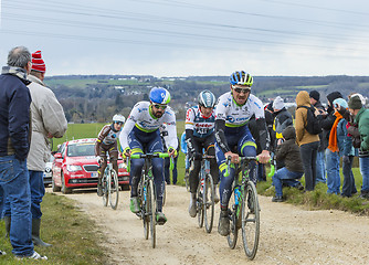 Image showing The Peloton on a Dirty Road - Paris-Nice 2016