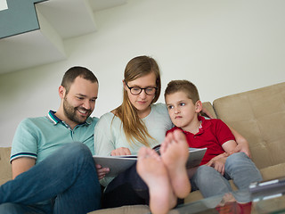 Image showing family with little boy enjoys in the modern living room