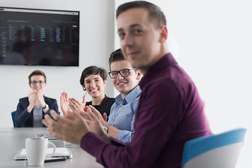 Image showing Group of young people meeting in startup office