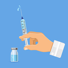 Image showing Doctor holding syringe in hand