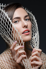 Image showing Beautiful girl with net