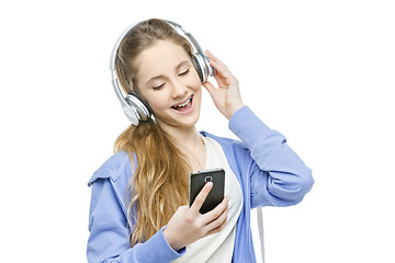 Image showing Teen age girl with headphones