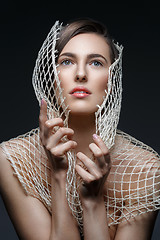 Image showing Beautiful girl with net
