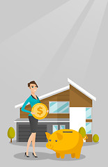 Image showing Woman saving money in piggy bank for buying house.