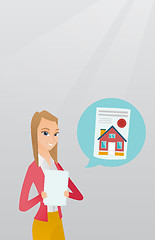 Image showing Woman reading real estate advertisement.