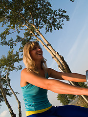 Image showing Happy girl on bicycle