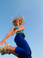 Image showing Jumping sporty girl