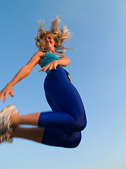 Image showing Jumping sporty girl