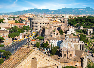 Image showing Colosseum and basilica in Rome