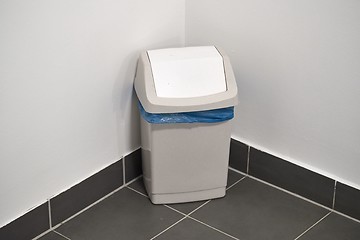 Image showing Dustbin in a public corridor corner