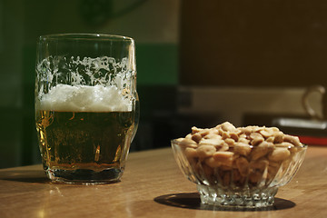 Image showing Beer and peanuts