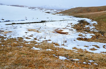 Image showing Snowy steppe at the mountains