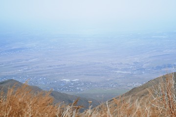 Image showing View onto the village from mountains 