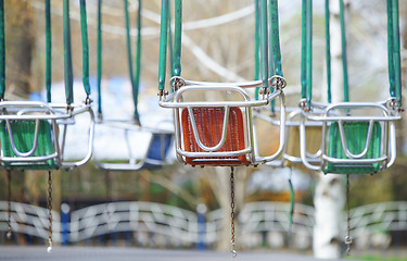 Image showing Empty chain swing in amuzement park