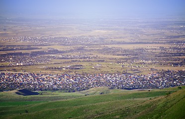 Image showing High angle view onto the green fields and villages