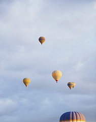 Image showing Group of air balloons flying in the sky