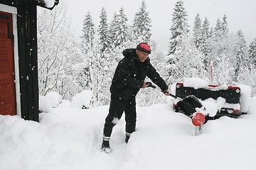 Image showing Man shoveling snow