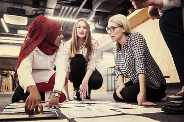 Image showing black muslim woman having meeting with Multiethnic  startup busi