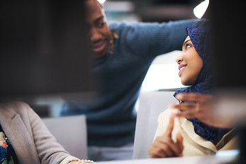 Image showing black muslim female software developer at work