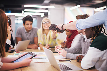 Image showing Multiethnic startup business team having meeting